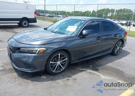 2022 Honda Civic Touring from USA, damaged, VIN 2HGFE1F9XNH303041